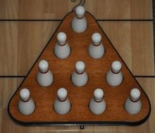 Set of 10 Solid Wood Bowling Pins with Pin Setter Set of 10 Solid Wood Bowling Pins with Pin Setter